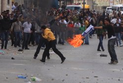 Arabs Burn Israeli Flag at Kalandia