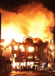 Building in London on fire, torched by rioters