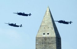 North American B-25 Mitchell bombers fly the Doolittle Raid formation during a flyover near the Washington Monument in Washington, D.C.
