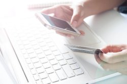 Person checking credit card bill