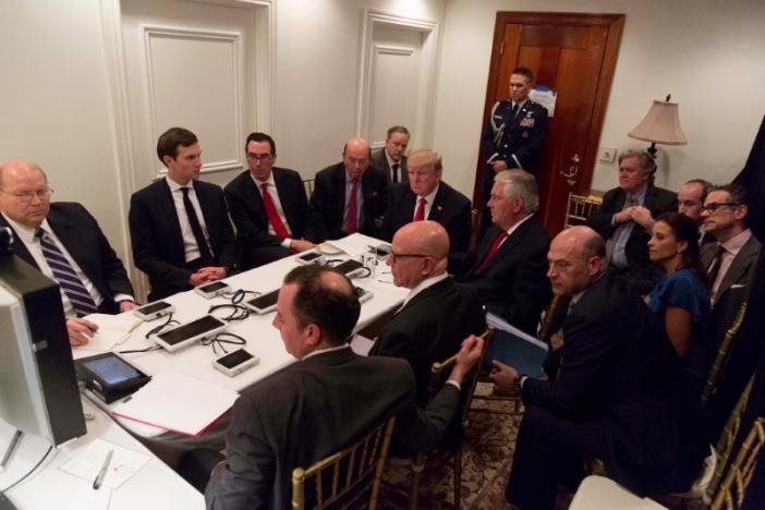 President Trump meeting with his National Security team and being briefed by Chairman of the Joint Chiefs of Staff General Joseph Dunford via secure video after a missile strike on Syria while inside the Sensitive Compartmented Information Facility at his Mar-a-Lago resort in West Palm Beach, Florida. White House Press Secretary Sean Spicer stated that this image has been digitally edited for security purposes. The White House/Handout via REUTERS