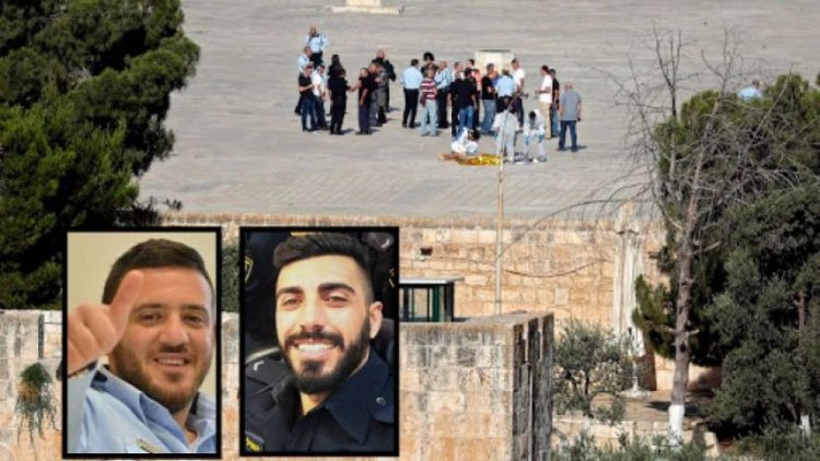 Slain police officers Kamil Shnan (left) and Hael Sathawi against the backdrop of a forensic team surrounding the body of an assailant on the Temple Mount, July 14, 2017. After shooting, Israeli Arab assailants entered Temple Mount complex and were shot and killed by police; Israel cancels Friday prayers at the site for first time in years.