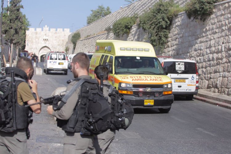 Emergency personnel at the site of the shooting attack in Jerusalem's Old City, July 14, 2017.Olivier Fitoussi