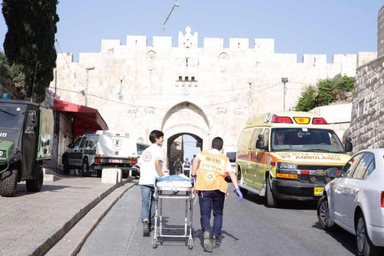 Emergency personnel at the site of the shooting attack in Jerusalem's Old City, July 14, 2017. Credit Olivier Fitoussi