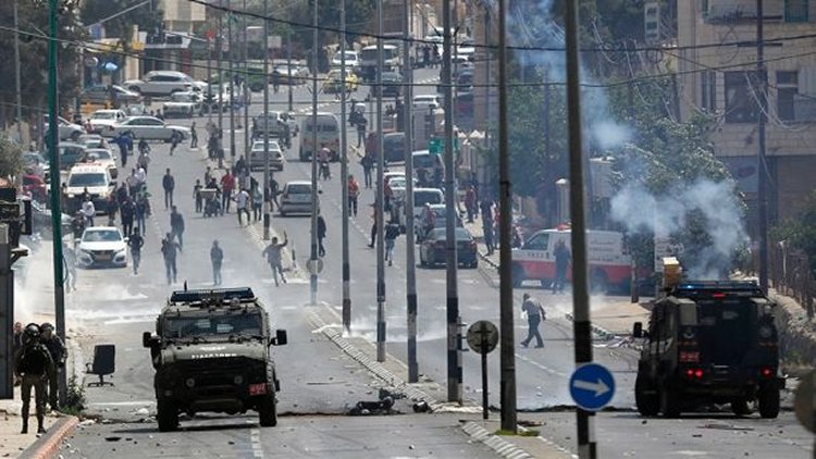 May 14, 2018: Palestinians clash with Israeli troops following a protest against the opening of the U.S. embassy in Jerusalem, in the West Bank city of Bethlehem. (AP)