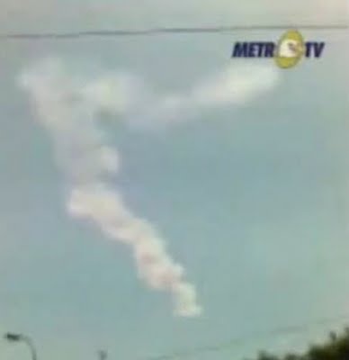The dusty tail of an asteroid explosion can be seen over Bone, Indonesia, on October 8th, 2009.