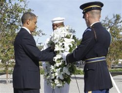 President Barack Obama lays a wreath at the Pentagon Memorial, on 11 Sep 2010, marking the ninth anniversary of the September 11, 2001 attacks.