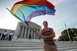 Gay rights advocate in front of the Supreme Court building