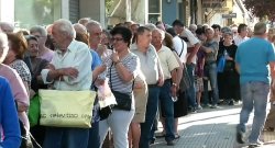 Greek people in line at a bank